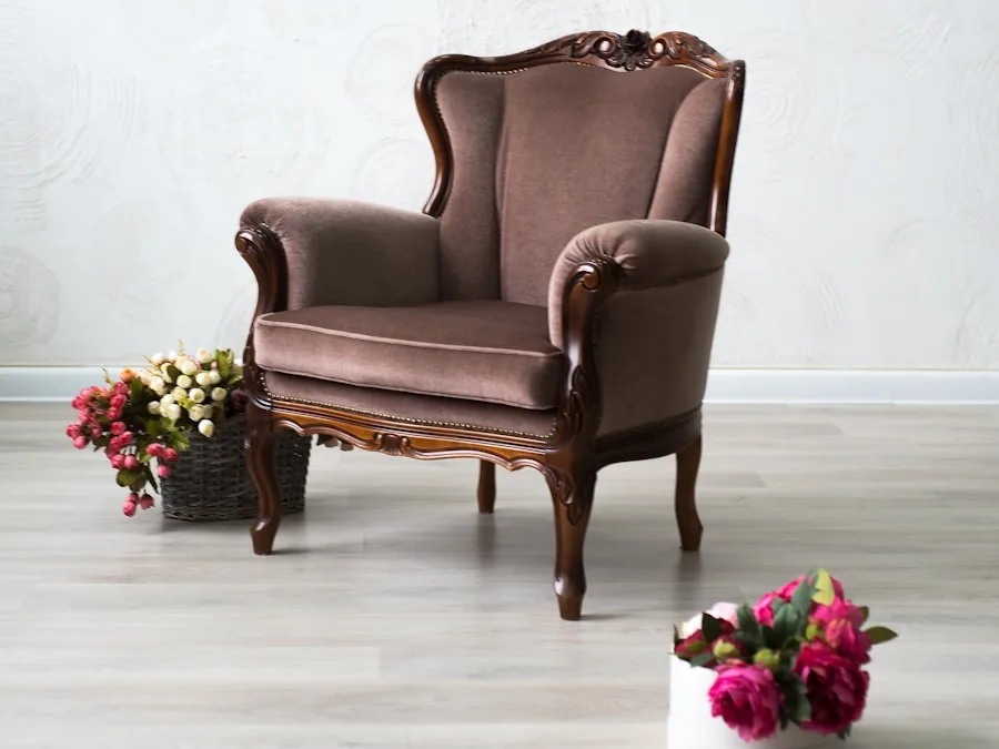 The Ashford armchair with a high back and scrolled solid-ash arms, upholstered in warm brown.
